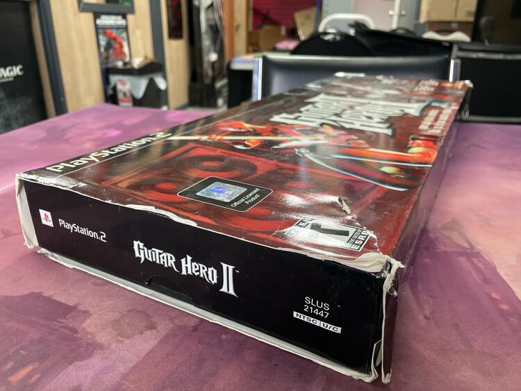 Guitar Hero II - PlayStation 2 Wired Red Gibson Bundle (usagé)